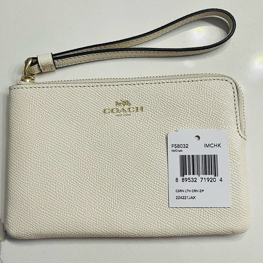 Brand new White/gold Coach wristlet
